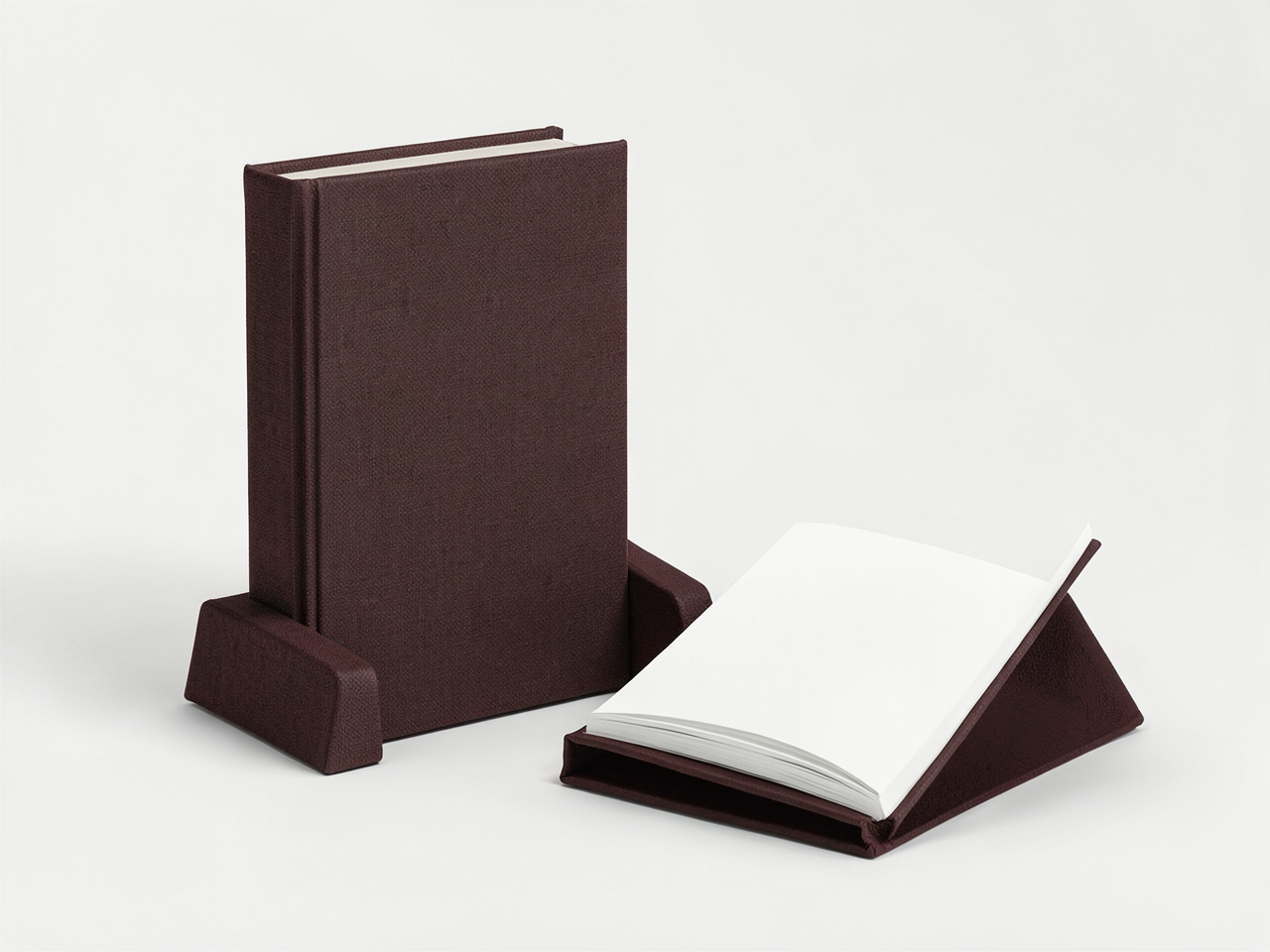 Illustration of an open book resting on a firm surface with its covers supported