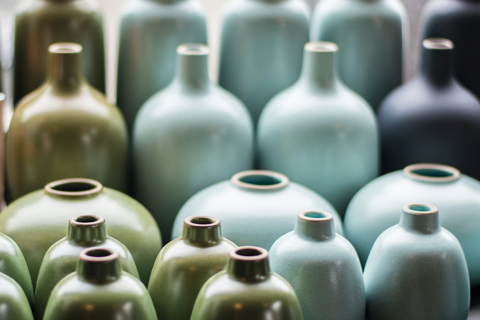 Rows of filed stoneware jugs seen close together